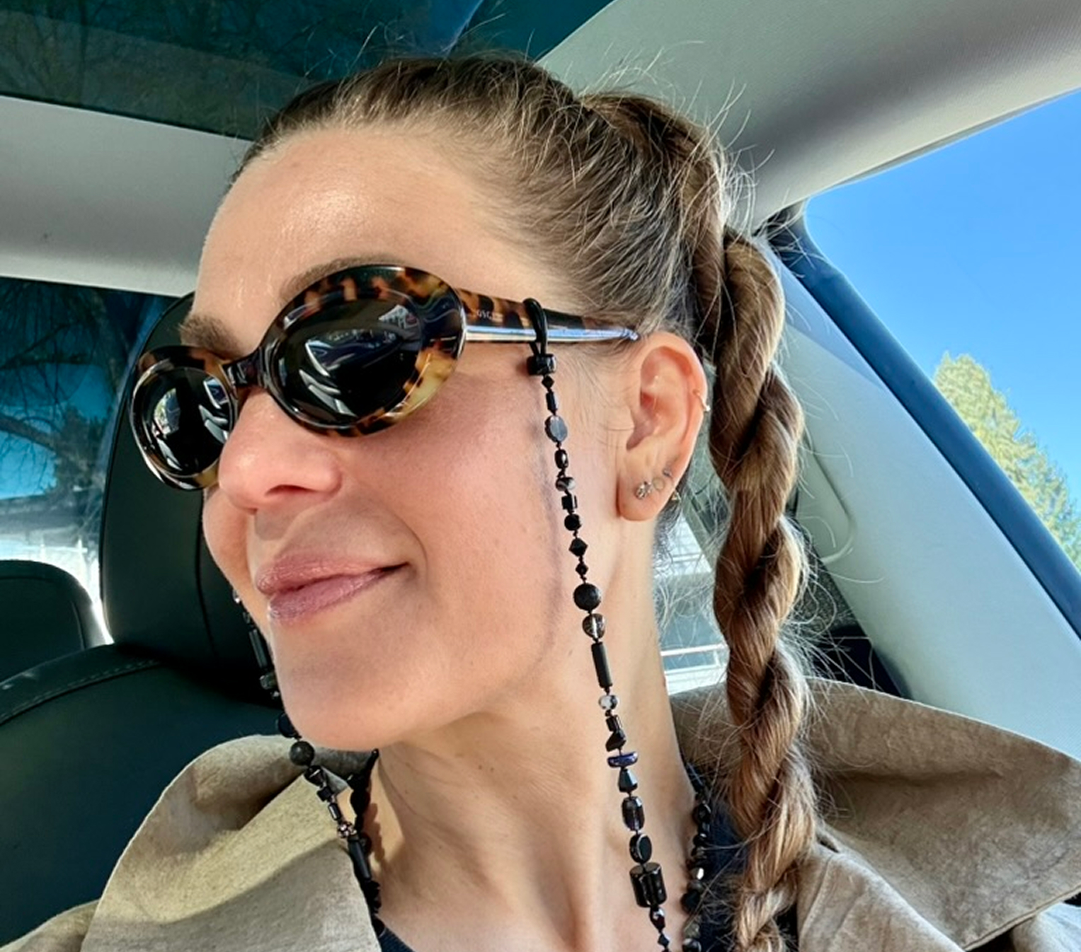 Worn on sunglasses in car