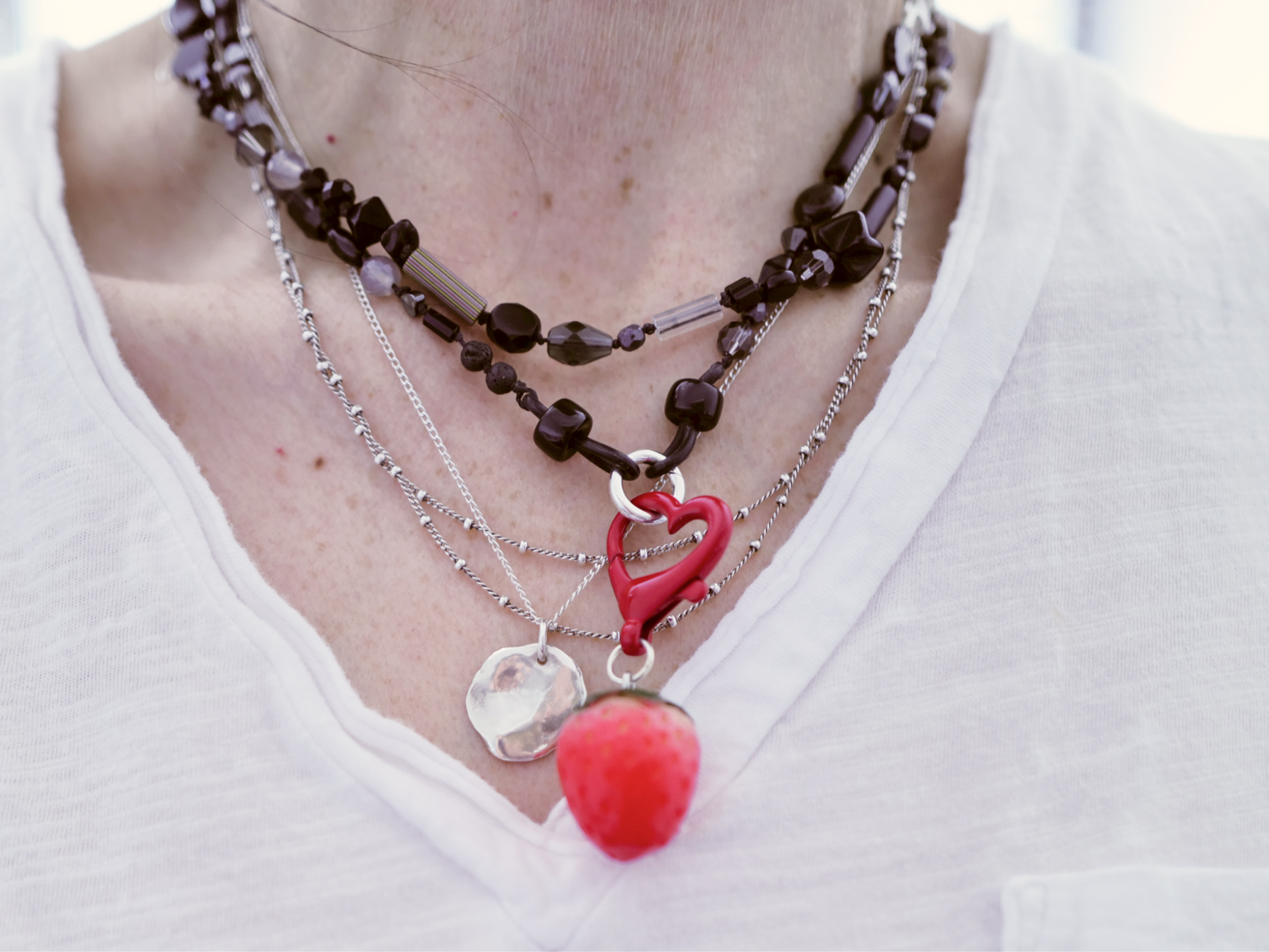 Worn with strawberry pendant