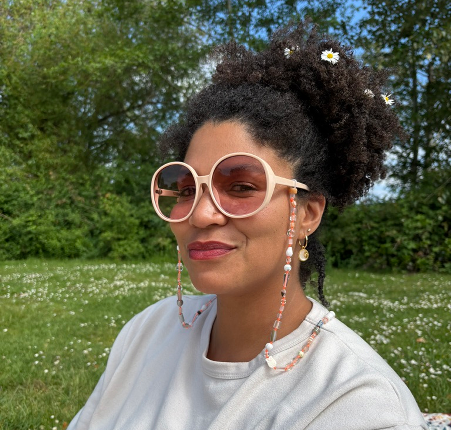 Worn with round sunglasses in field